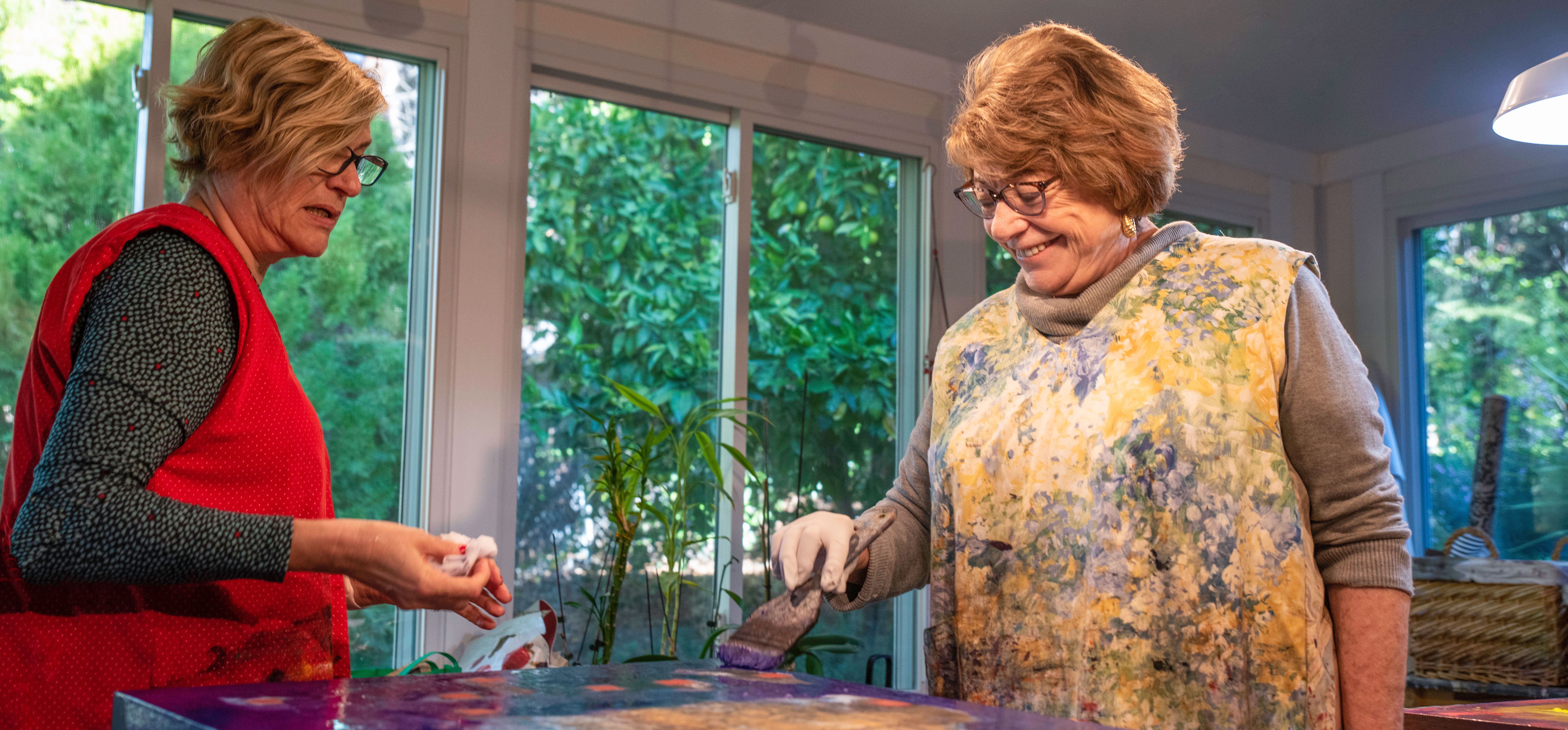 Terenia Offenbacker has regained her love of painting after minimally invasive robotic surgery to correct a complex spinal degeneration.